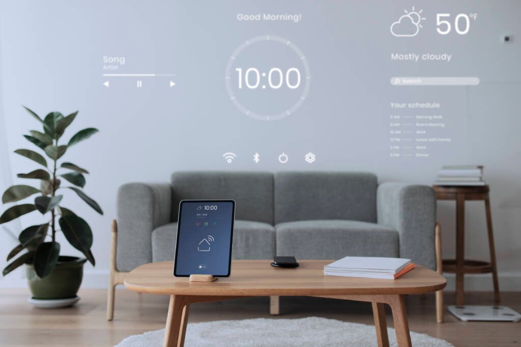 Digital tablet screen with smart home controller on a wooden tab Digital tablet screen with smart home controller on a wooden tab